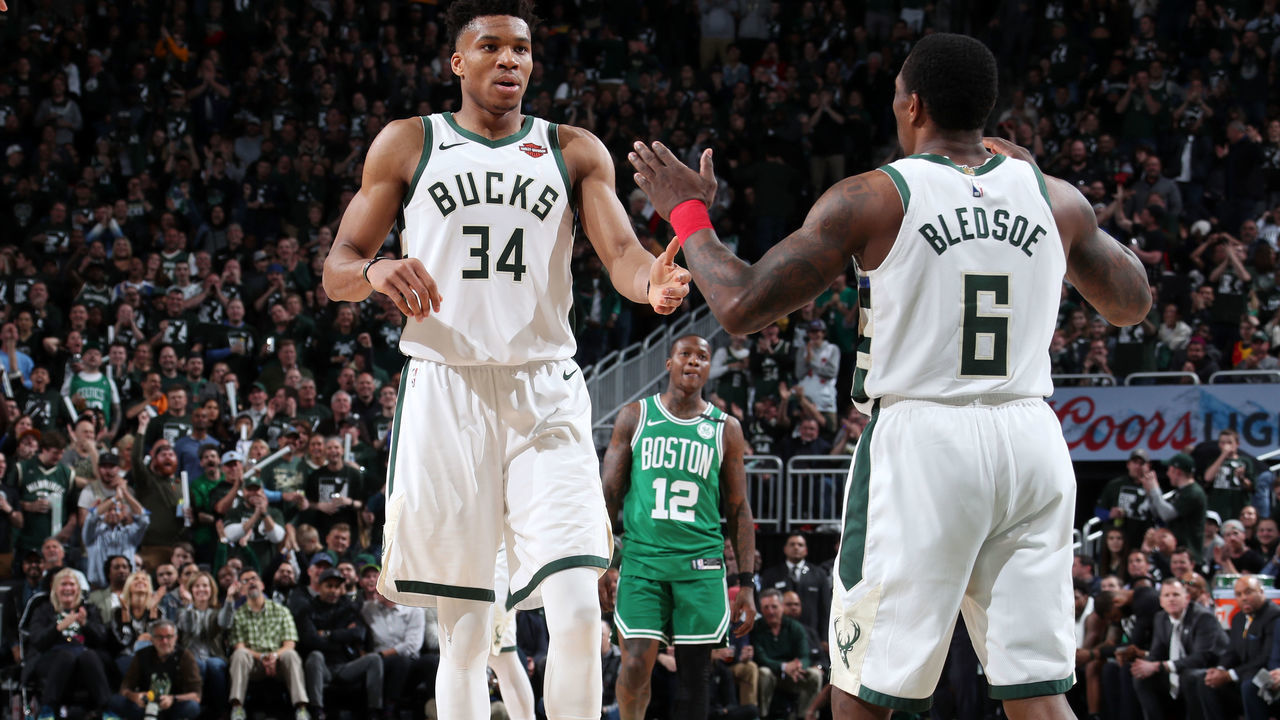 MILWAUKEE, WI - MAY 8: Giannis Antetokounmpo #34 of the Milwaukee Bucks hi-fives teammate during Game Five of the Eastern Conference Semifinals of the 2019 NBA Playoffs on May 8, 2019 at the Fiserv Forum in Milwaukee, Wisconsin. NOTE TO USER: User expressly acknowledges and agrees that, by downloading and/or using this photograph, user is consenting to the terms and conditions of the Getty Images License Agreement. Mandatory Copyright Notice: Copyright 2019 NBAE