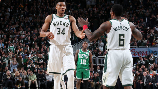 MILWAUKEE, WI - MAY 8: Giannis Antetokounmpo #34 of the Milwaukee Bucks hi-fives teammate during Game Five of the Eastern Conference Semifinals of the 2019 NBA Playoffs on May 8, 2019 at the Fiserv Forum in Milwaukee, Wisconsin. NOTE TO USER: User expressly acknowledges and agrees that, by downloading and/or using this photograph, user is consenting to the terms and conditions of the Getty Images License Agreement. Mandatory Copyright Notice: Copyright 2019 NBAE