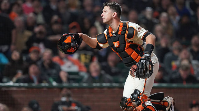 SAN FRANCISCO, CA - MAY 01: Buster Posey #28 of the San Francisco Giants chases after a foul pop-up off the bat of Enrique Hernandez #14 of the Los Angeles Dodgers in the top of the seventh inning of a Major League Baseball game at Oracle Park on May 1, 2019 in San Francisco, California.