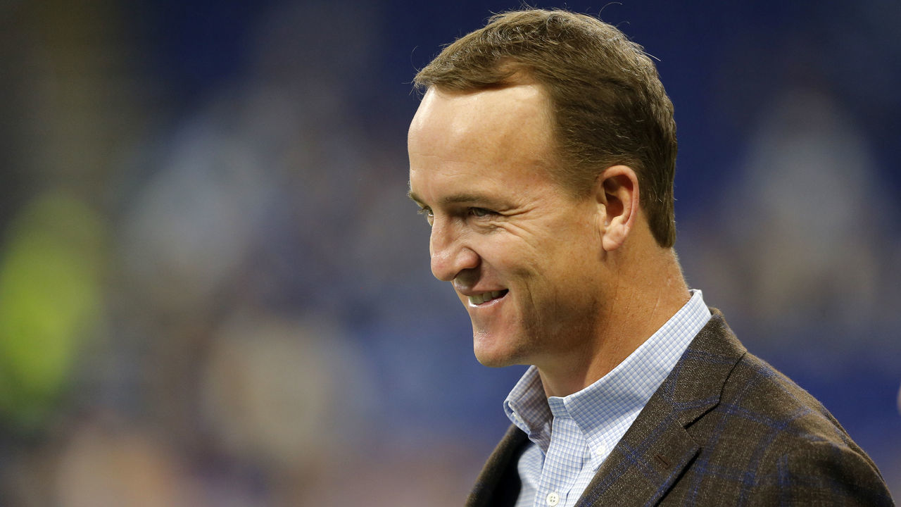INDIANAPOLIS, IN - NOVEMBER 18: Former Indianapolis Colts Quarterback Peyton Manning makes and appearance back at Lucas Oil Stadium for back for Reggie Wayne's induction to the ring of honor during the NFL game between the Tennessee Titans and Indianapolis Colts on November 18, 2018, at Lucas Oil Stadium in Indianapolis, IN.