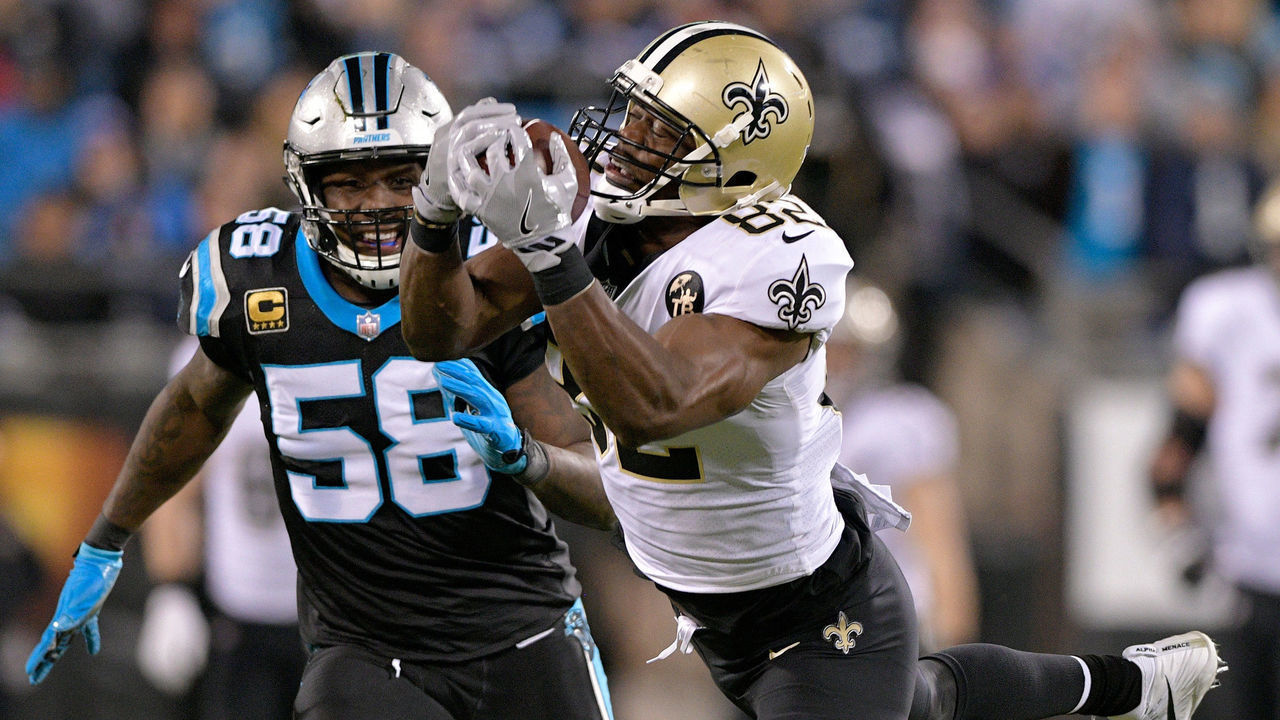 CHARLOTTE, NC - DECEMBER 17: Benjamin Watson #82 of the New Orleans Saints catches a pass against Thomas Davis #58 of the Carolina Panthers in the second quarter during their game at Bank of America Stadium on December 17, 2018 in Charlotte, North Carolina.