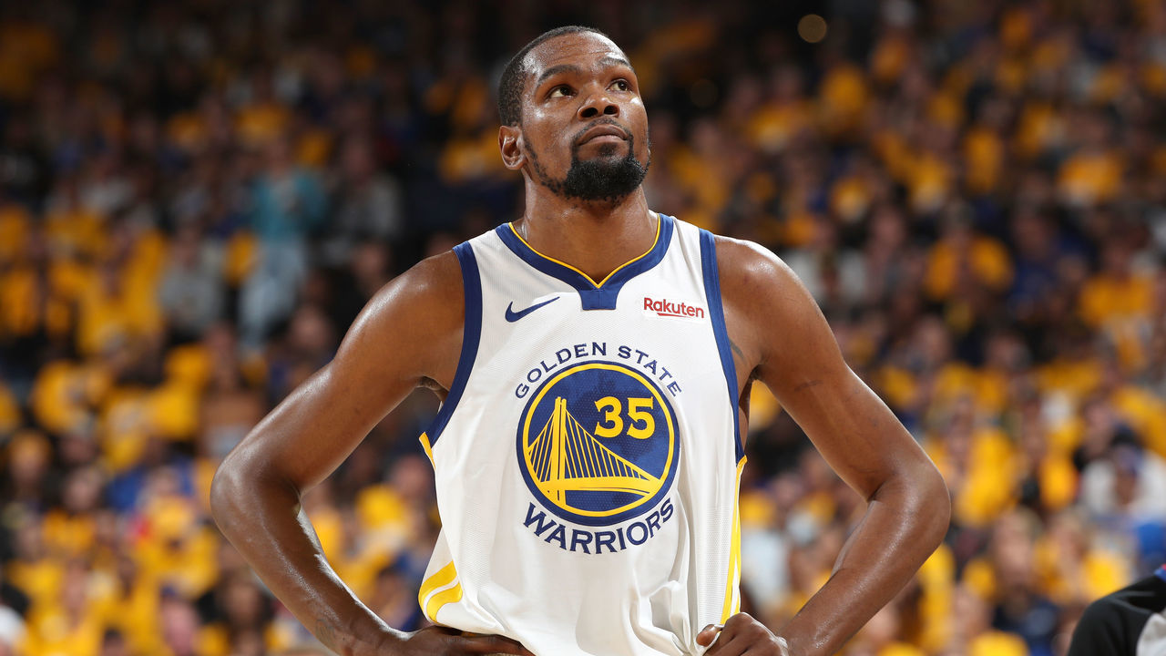 OAKLAND, CA - MAY 8: Kevin Durant #35 of the Golden State Warriors looks on against the Houston Rockets during Game Five of the Western Conference Semifinals of the 2019 NBA Playoffs on May 8, 2019 at ORACLE Arena in Oakland, California. NOTE TO USER: User expressly acknowledges and agrees that, by downloading and/or using this photograph, user is consenting to the terms and conditions of Getty Images License Agreement. Mandatory Copyright Notice: Copyright 2019 NBAE