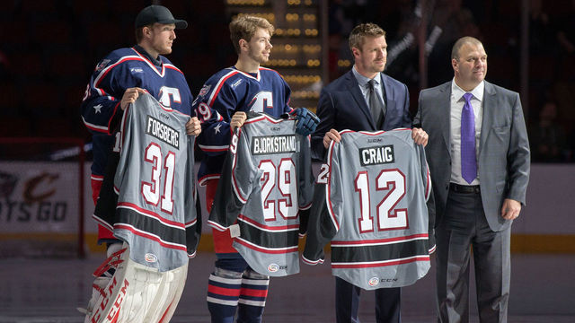 CLEVELAND, OH - JANUARY 20: Cleveland Monsters G Anton Forsberg (31), Cleveland Monsters RW Oliver Bjorkstrand (29), and Cleveland Monsters LW Ryan Craig (12) are presented with their All-Star jerseys by Cleveland Monsters general manager Bill Zito prior to the AHL hockey game between the Rockford IceHogs and and Cleveland Monsters on January 20, 2017, at Quicken Loans Arena in Cleveland, OH. Cleveland defeated Rockford 1-0.