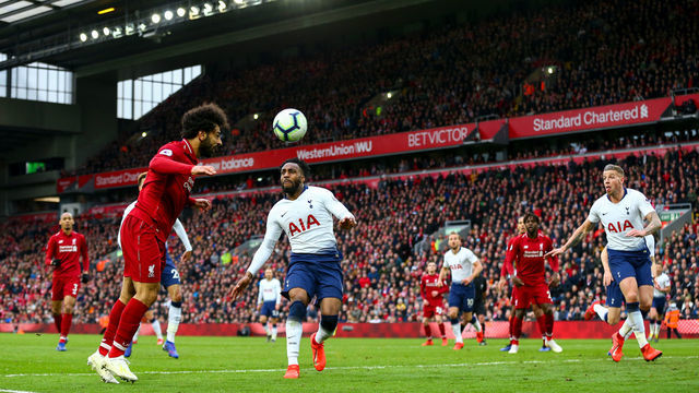 LIVERPOOL, ENGLAND - MARCH 31: Mohamed Salah of Liverpool heads towards goal which results in Toby Alderweireld of Tottenham Hotspur scoring an own goal to make it 2-1 during the Premier League match between Liverpool FC and Tottenham Hotspur at Anfield on March 31, 2019 in Liverpool, United Kingdom.