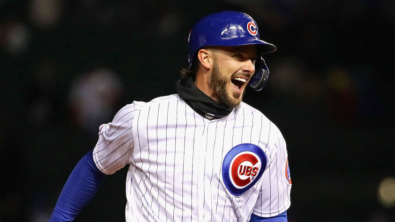 CHICAGO, ILLINOIS - MAY 07: Kris Bryant #17 of the Chicago Cubs smiles as he runs the bases after hitting the game-winning, three run home run in the bottom of the 9th inning against the Miami Marlins at Wrigley Field on May 07, 2019 in Chicago, Illinois. The Cubs defeated the Marlins 5-2.