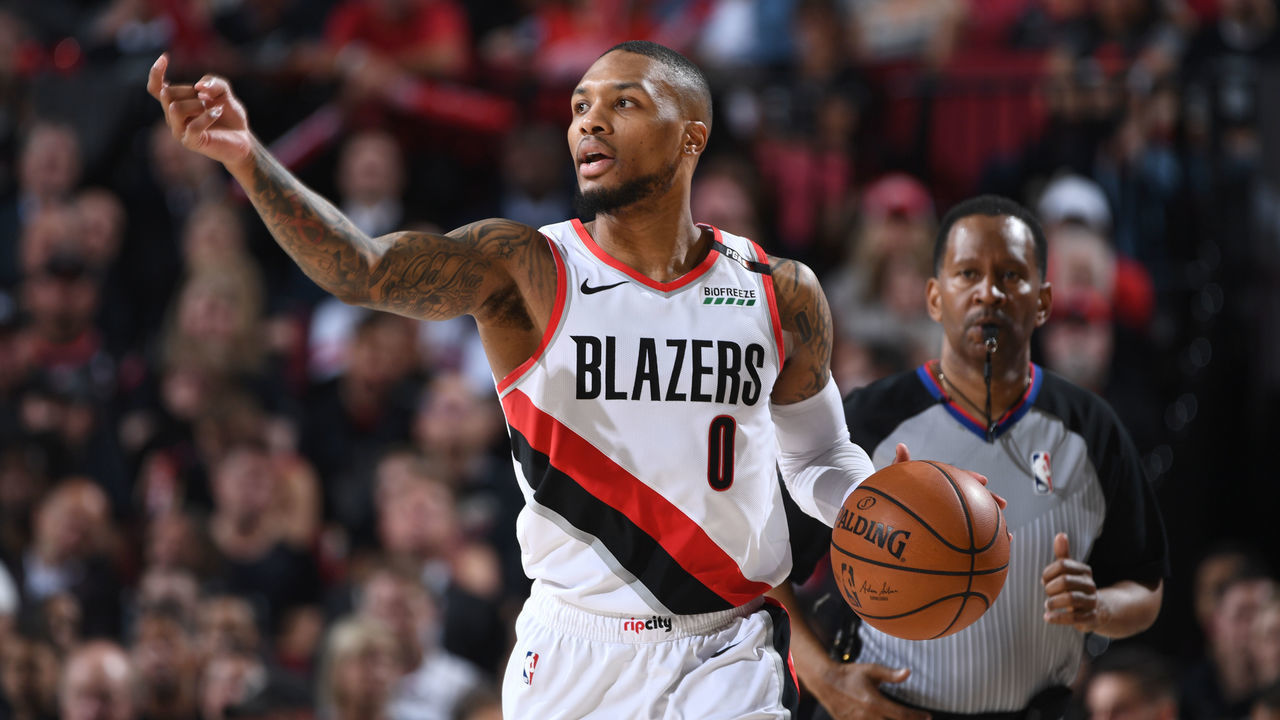 PORTLAND, OR - MAY 9: Damian Lillard #0 of the Portland Trail Blazers handles the ball against the Denver Nuggets during Game Six of the Western Conference Semifinals of the 2019 NBA Playoffs on May 9, 2019 at the Moda Center in Portland, Oregon. NOTE TO USER: User expressly acknowledges and agrees that, by downloading and/or using this photograph, user is consenting to the terms and conditions of the Getty Images License Agreement. Mandatory Copyright Notice: Copyright 2019 NBAE