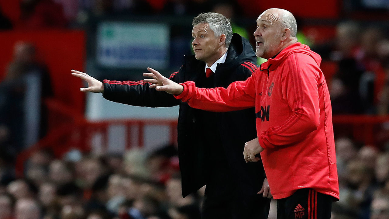 Manchester United manager Ole Gunnar Solskjaer (left) and first-team coach Mike Phelan on the touchline during the Premier League match at Old Trafford, Manchester.
