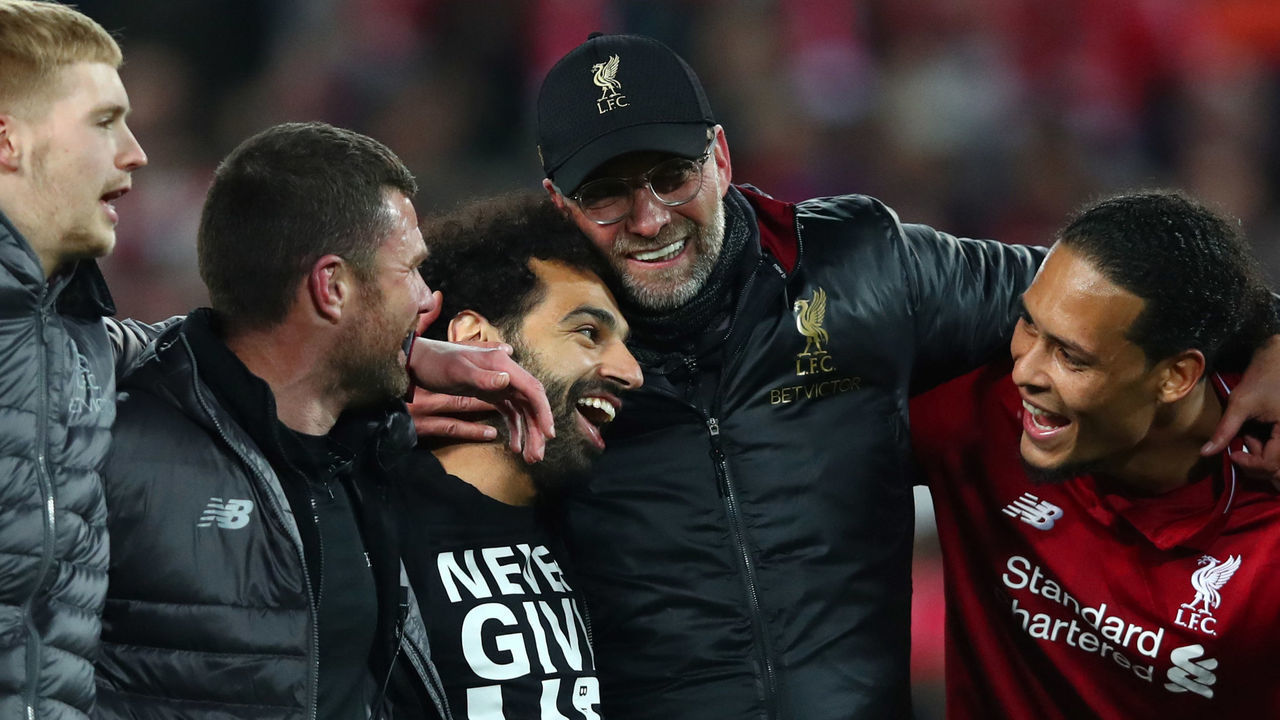 LIVERPOOL, ENGLAND - MAY 07: Jurgen Klopp, Manager of Liverpool, Mohamed Salah of Liverpool and Virgil van Dijk celebrate after the UEFA Champions League Semi Final second leg match between Liverpool and Barcelona at Anfield on May 07, 2019 in Liverpool, England.