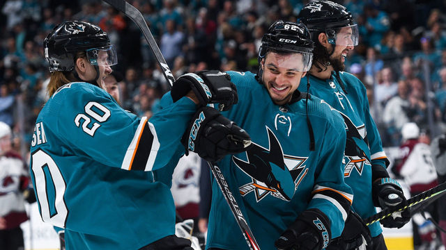 SAN JOSE, CA - MAY 08: San Jose Sharks forward Kevin Labanc (62), center, celebrates with forward Marcus Sorensen (20) after winning game seven of the second round of the Stanley Cup Playoffs between the Colorado Avalanche and the San Jose Sharks on May 8, 2019 at SAP Center in San Jose, CA.