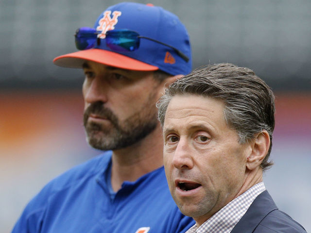 NEW YORK, NY - SEPTEMBER 8: Manager Mickey Callaway #36 of the New York Mets stands with Mets COO Jeff Wilpon as they watch David Wright play in a simulated game before an MLB baseball game against the Philadelphia Phillies on September 8, 2018 at Citi Field in the Flushing neighborhood of the Queens borough of New York City. Mets won 10-5.