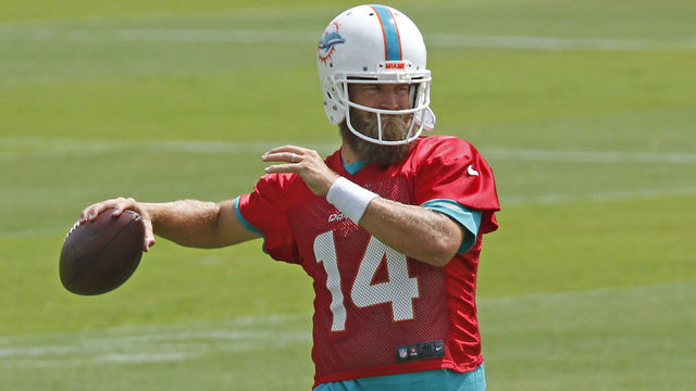 DAVIE, FL - APRIL 17: Ryan Fitzpatrick #14 of the Miami Dolphins throws the ball during the team's voluntary minicamp on April 17, 2019 at the Miami Dolphins training facility in Davie, Florida.