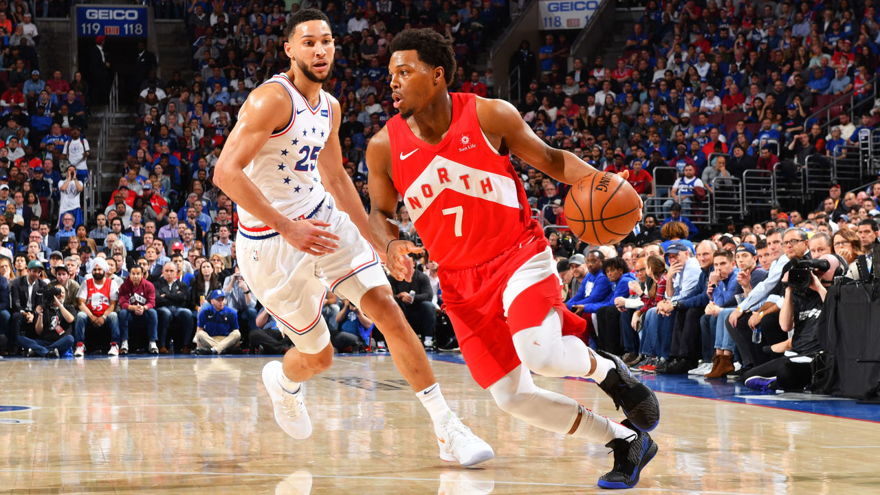 PHILADELPHIA, PA - MAY 9: Kyle Lowry #7 of the Toronto Raptors handles the ball against Ben Simmons #25 of the Philadelphia 76ers during Game Six of the Eastern Conference Semifinals on May 9, 2019 at the Wells Fargo Center in Philadelphia, Pennsylvania NOTE TO USER: User expressly acknowledges and agrees that, by downloading and/or using this Photograph, user is consenting to the terms and conditions of the Getty Images License Agreement. Mandatory Copyright Notice: Copyright 2019 NBAE