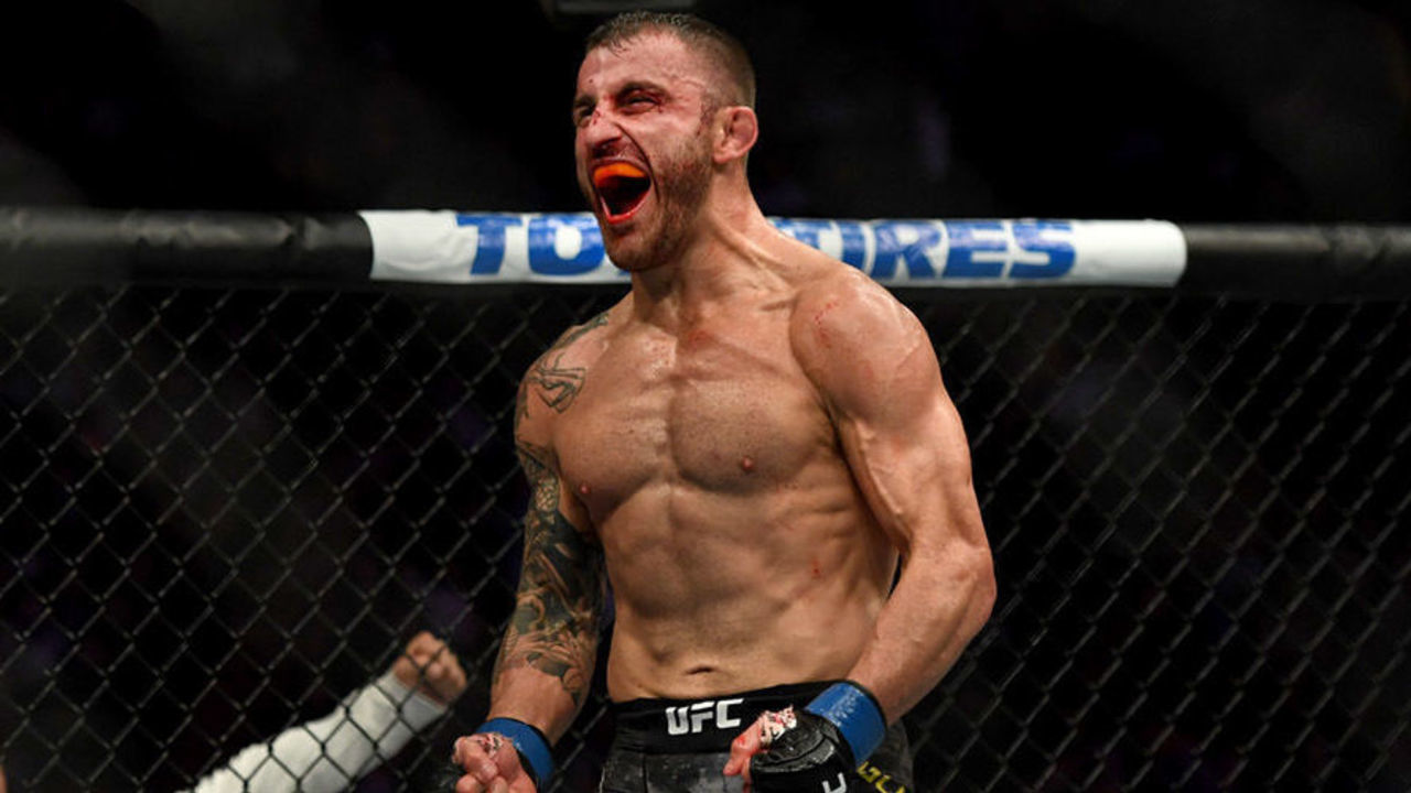 INGLEWOOD , CA - DECEMBER 29: Alexander Volkanovski, blue, reacts after defeating Chad Mendes, red, via TKO during UFC 232 at the Forum in Inglewood Ca, Saturday, Dec 29, 2018.