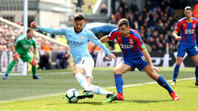 Manchester City's David Silva (left) and Crystal Palace's James McArthur (right) during the Premier League match at Selhurst Park, London.