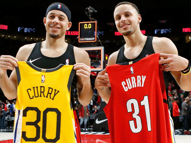 PORTLAND, OR - DECEMBER 29: Stephen Curry #30 of the Golden State Warriors trades jerseys after the game with his brother Seth Curry #31 of the Portland Trail Blazers at Moda Center on December 29, 2018 in Portland, Oregon.