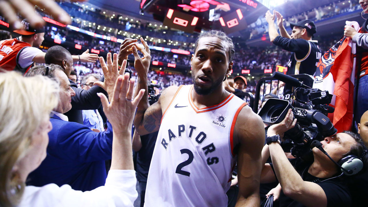 TORONTO, ON - MAY 12: Kawhi Leonard #2 of the Toronto Raptors leaves the court after sinking a buzzer beater to win Game Seven of the second round of the 2019 NBA Playoffs against the Philadelphia 76ers at Scotiabank Arena on May 12, 2019 in Toronto, Canada.