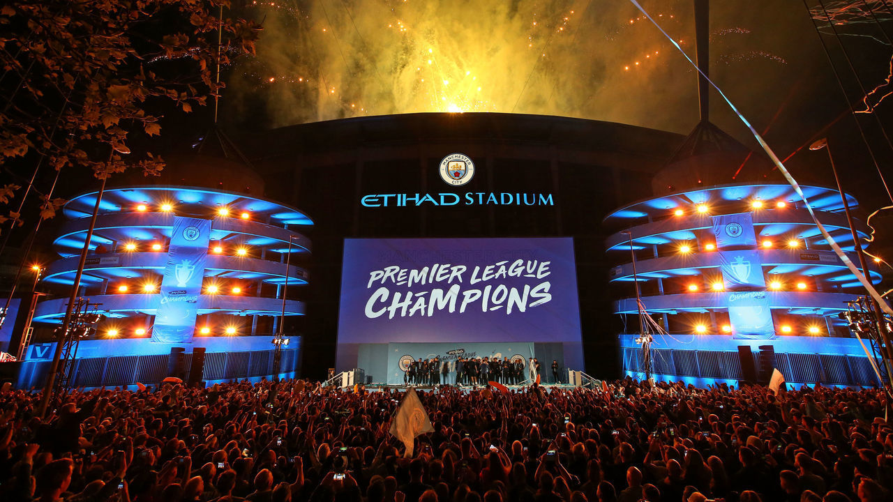 MANCHESTER, ENGLAND - MAY 12: A general view outside the stadium as the players of Manchester City celebrate in front of their fans with the trophy after winning the Premier League title at the Etihad Stadium on May 12, 2019 in Manchester, England.