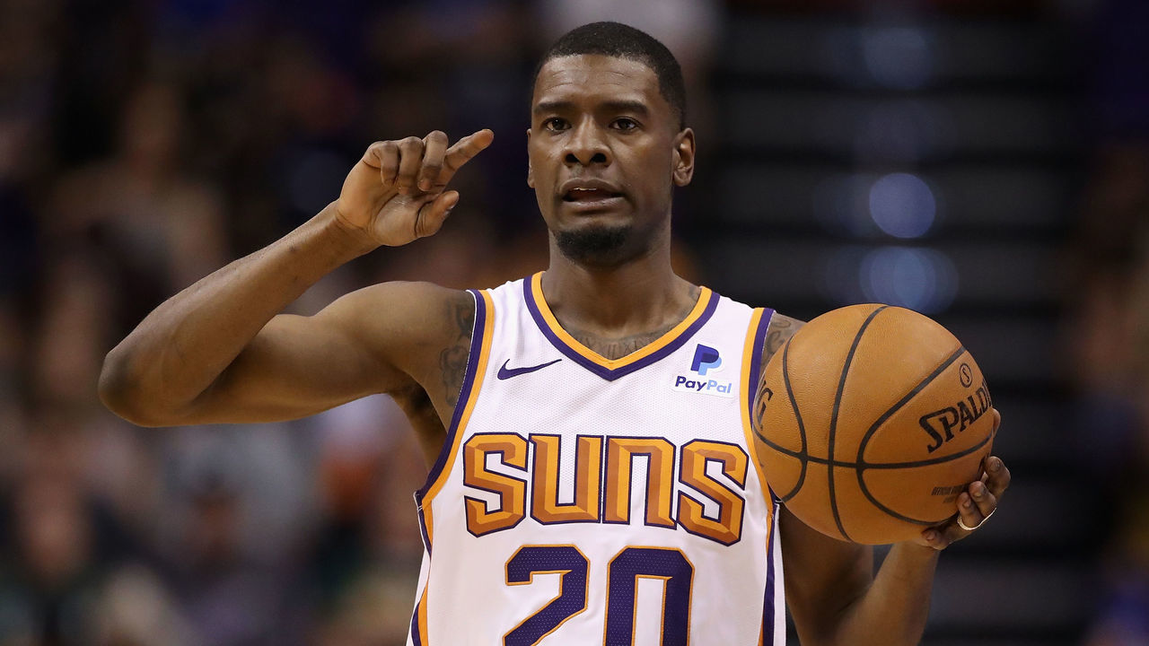 PHOENIX, ARIZONA - APRIL 03: Josh Jackson #20 of the Phoenix Suns handles the ball during the first half of the NBA game against the Utah Jazz at Talking Stick Resort Arena on April 03, 2019 in Phoenix, Arizona.
