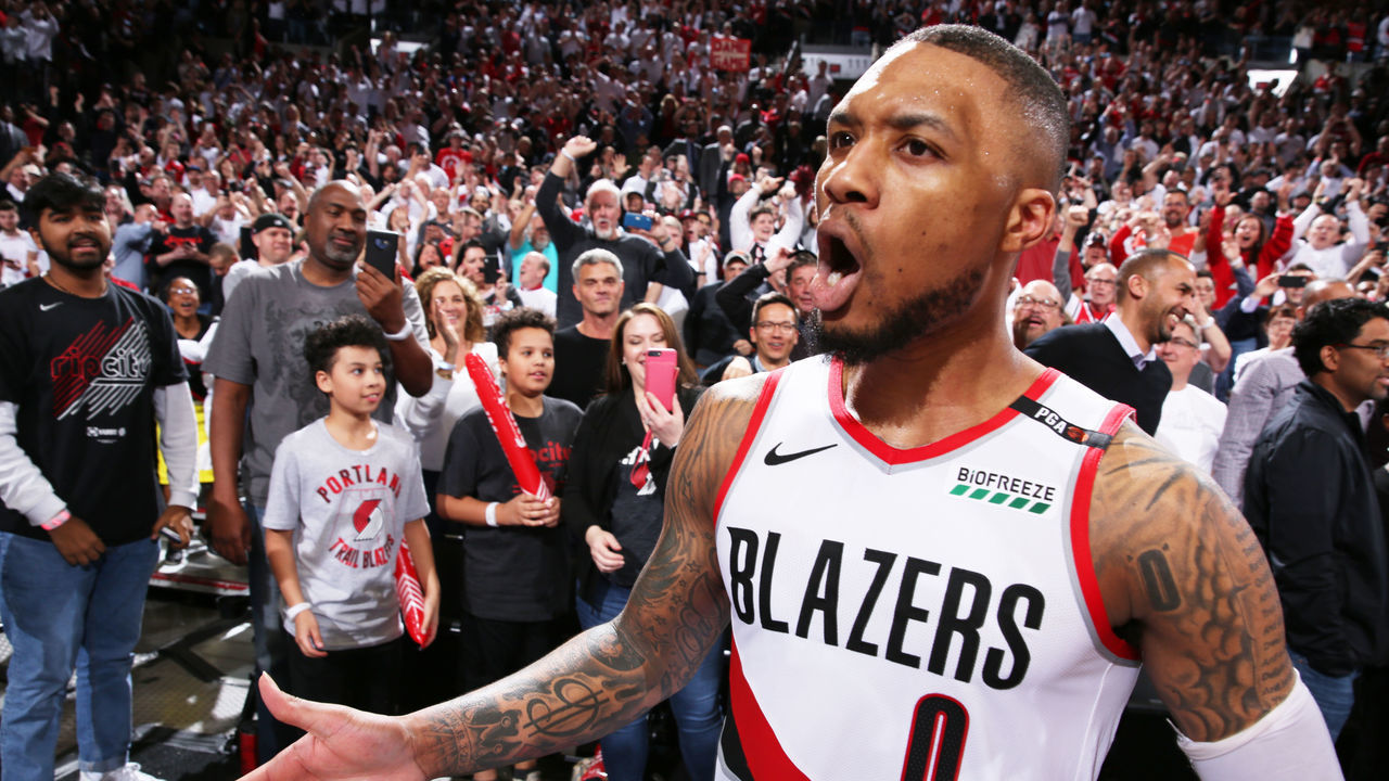 PORTLAND, OR - APRIL 23: Damian Lillard #0 of the Portland Trail Blazers reacts after he hit a game winning three-pointer against the Oklahoma City Thunder after Game Five Round One of the 2019 NBA Playoffs on April 23, 2019 at the Moda Center in Portland, Oregon. Mandatory Copyright Notice: Copyright 2019 NBAE