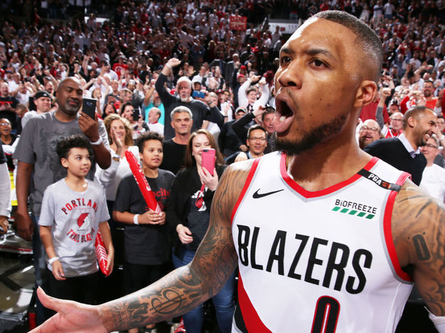 PORTLAND, OR - APRIL 23: Damian Lillard #0 of the Portland Trail Blazers reacts after he hit a game winning three-pointer against the Oklahoma City Thunder after Game Five Round One of the 2019 NBA Playoffs on April 23, 2019 at the Moda Center in Portland, Oregon. Mandatory Copyright Notice: Copyright 2019 NBAE