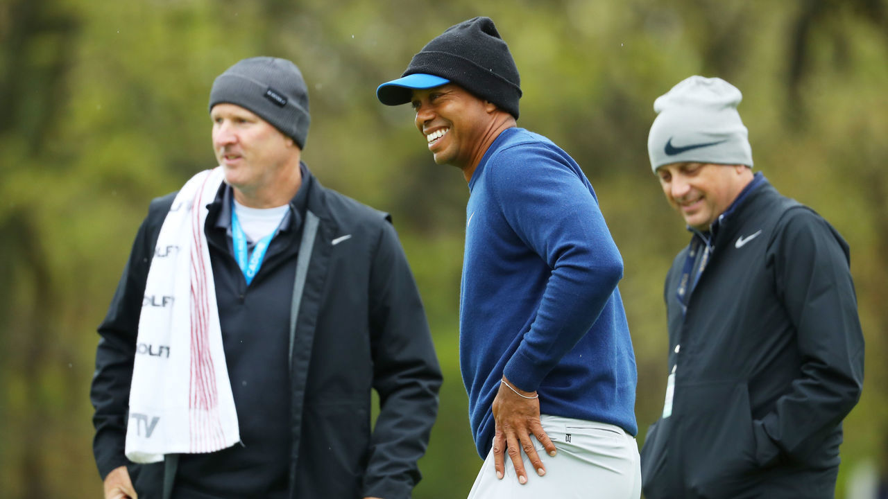 BETHPAGE, NEW YORK - MAY 13: Tiger Woods of the United States and caddie Joe LaCava look on during a practice round prior to the PGA Championship at Bethpage Black on May 13, 2019 in Bethpage, New York.