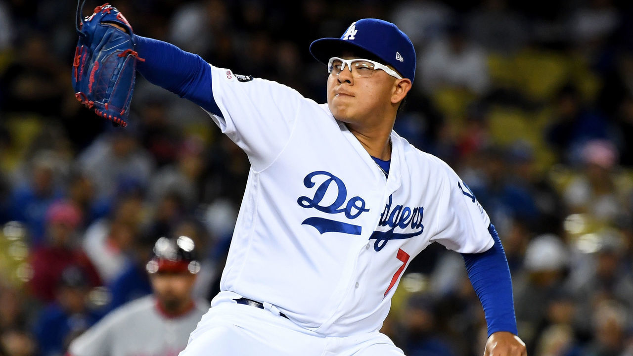 LOS ANGELES, CA - MAY 10: Relief pitcher Julio Urias #7 of the Los Angeles Dodgers delivers in the seventh inning of the game against the Washington Nationals at Dodger Stadium on May 10, 2019 in Los Angeles, California.