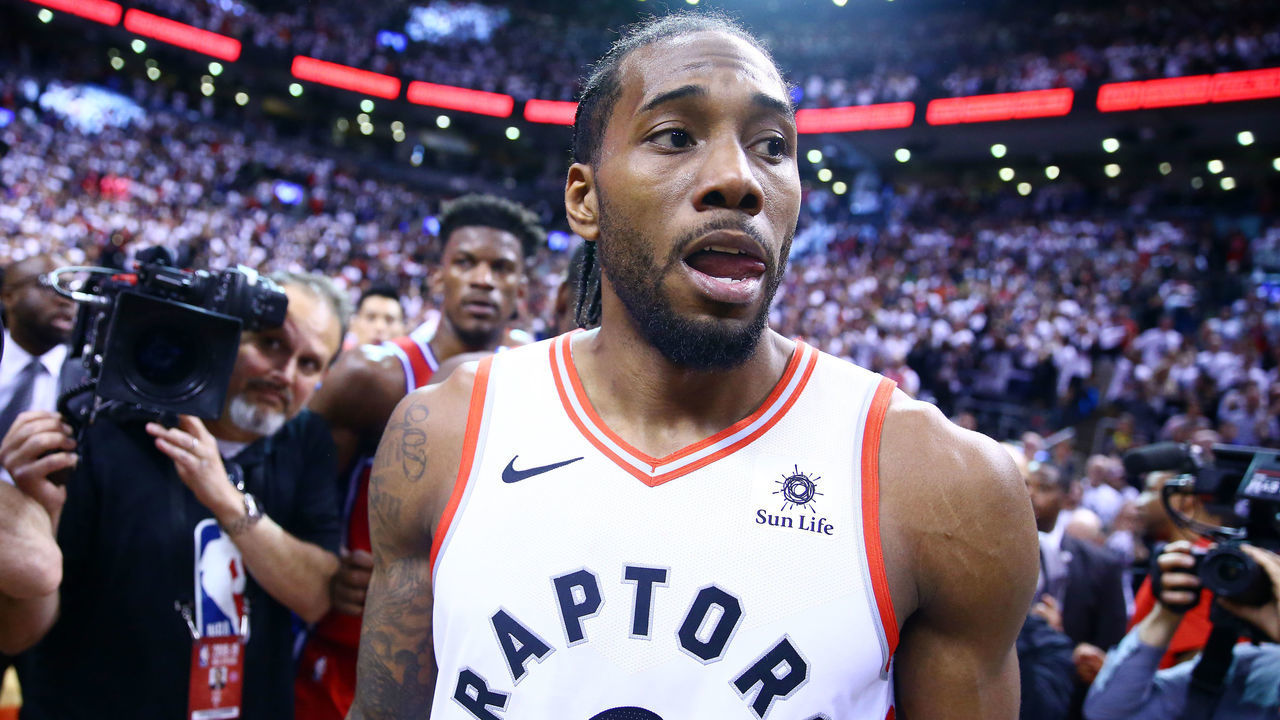 TORONTO, ON - MAY 12: Kawhi Leonard #2 of the Toronto Raptors looks on after sinking a buzzer beater to win Game Seven of the second round of the 2019 NBA Playoffs against the Philadelphia 76ers at Scotiabank Arena on May 12, 2019 in Toronto, Canada.