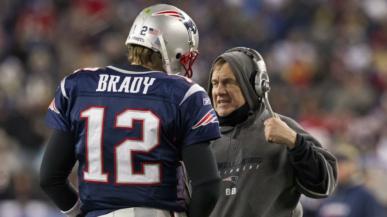 FOXBOROUGH, MA - JANUARY 14: New England Patriots quarterback Tom Brady talking to head coach Bill Belichick during a time out against the Denver Broncos during 2nd half action in the AFC Divisional Playoff game at Gillette Stadium on Saturday, Jan. 14, 2011.