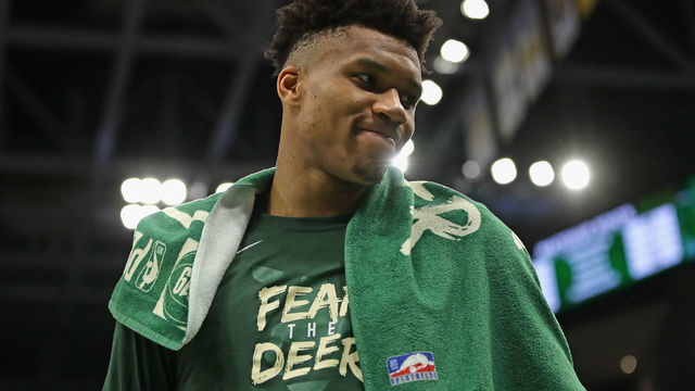 MILWAUKEE, WISCONSIN - MAY 08: Giannis Antetokounmpo #34 of the Milwaukee Bucks looks over at a teammates against Boston Celtics at Fiserv Forum on May 08, 2019 in Milwaukee, Wisconsin. The Bucks defeated the Celtics 116-91.