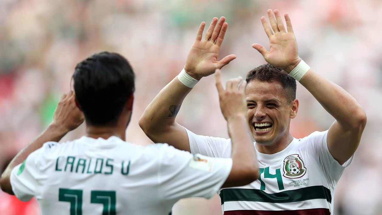 ROSTOV-ON-DON, RUSSIA - JUNE 23: Carlos Vela of Mexico celebrates with teammate Javier Hernandez after scoring a penalty for his team's first goal during the 2018 FIFA World Cup Russia group F match between Korea Republic and Mexico at Rostov Arena on June 23, 2018 in Rostov-on-Don, Russia.