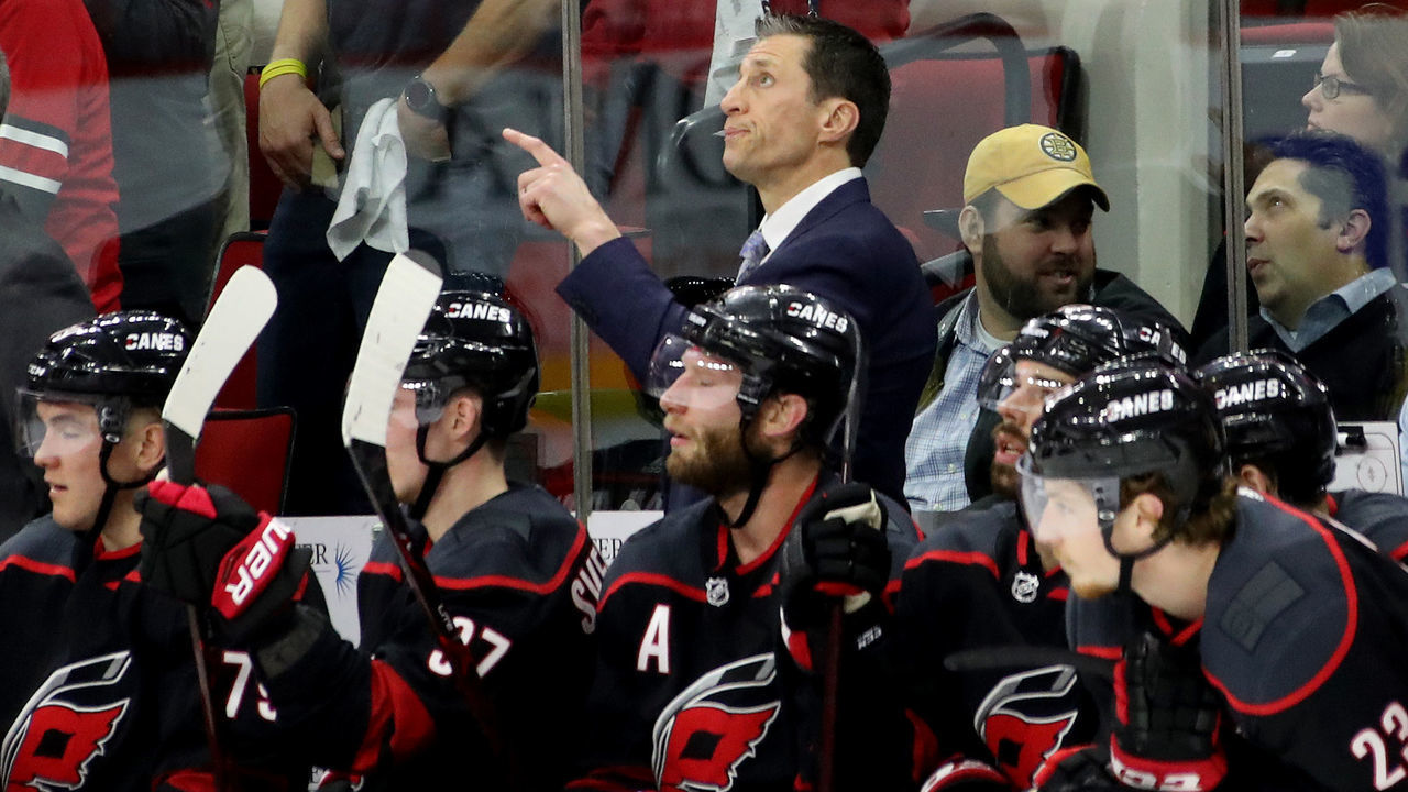RALEIGH, NORTH CAROLINA - MAY 14: Head coach Rod Brind'Amour of the Carolina Hurricanes looks on against the Boston Bruins during the first period in Game Three of the Eastern Conference Finals during the 2019 NHL Stanley Cup Playoffs at PNC Arena on May 14, 2019 in Raleigh, North Carolina.