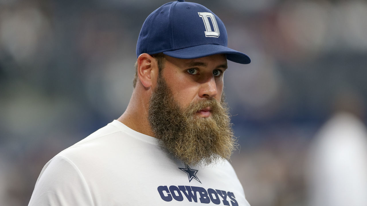 ARLINGTON, TX - OCTOBER 14: Dallas Cowboys Center Travis Frederick watches warm-up while on IR prior to the game between the Jacksonville Jaguars and Dallas Cowboys on October 14, 2018 at AT&T Stadium in Arlington, TX.
