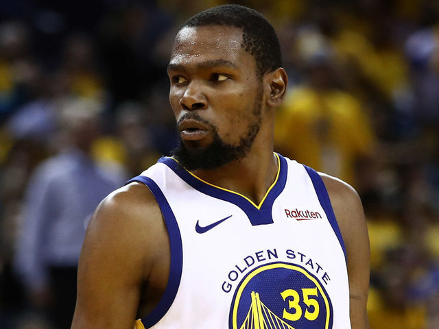 OAKLAND, CALIFORNIA - APRIL 13: Kevin Durant #35 of the Golden State Warriors reacts after making a basket against the LA Clippers during Game One of the first round of the 2019 NBA Western Conference Playoffs at ORACLE Arena on April 13, 2019 in Oakland, California.