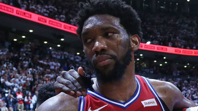 TORONTO, ON- MAY 12 - Toronto Raptors forward Pascal Siakam (43) consoles his fellow countryman Philadelphia 76ers center Joel Embiid (21) as the Toronto Raptors beat the Philadelphia 76ers 92-90 in game seven of their second round series in the NBA play-offs at Scotiabank Arena in Toronto. May 12, 2019. (Steve Russell/Toronto Star via Getty Images)
