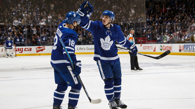 TORONTO, ON - DECEMBER 22: Mitch Marner #16 of the Toronto Maple Leafs celebrates his goal with teammate Andreas Johnsson #18 against the New York Rangers during the third period at the Scotiabank Arena on December 22, 2018 in Toronto, Ontario, Canada.