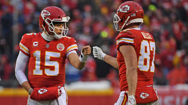 KANSAS CITY, MO - JANUARY 12: Quarterback Patrick Mahomes #15 of the Kansas City Chiefs givs tight end Travis Kelce #87 a fist pump after a play against the Indianapolis Colts, during the first half of the AFC Divisional Round playoff game at Arrowhead Stadium on January 12, 2019 in Kansas City, Missouri.