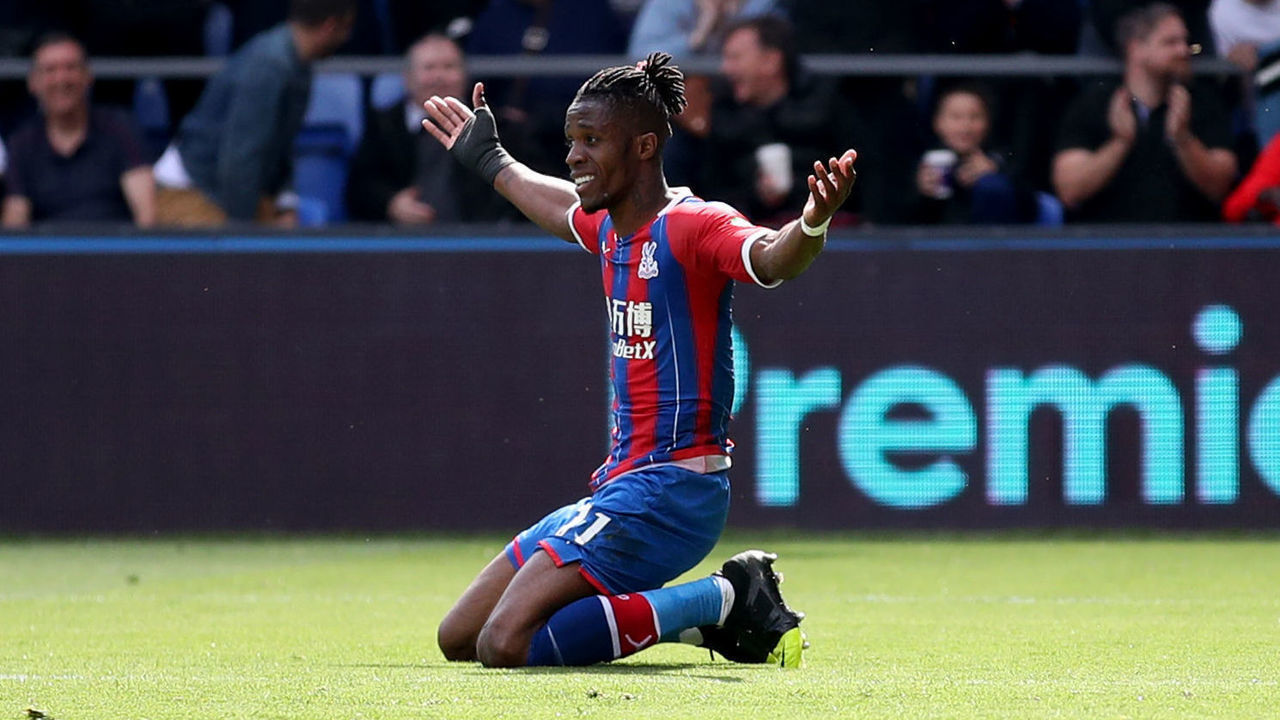 Crystal Palace's Wilfried Zaha celebrates after Bournemouth's Jack Simpson scores an own goal to make it 3-0 during the Premier League match at Selhurst Park, London.