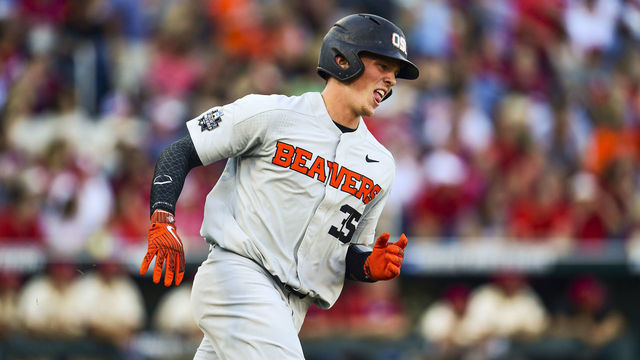 OMAHA, NE - JUNE 26: Adley Rutschman #35 of Oregon State rounds the bases after hitting a home run against Arkansas during the Division I Men's Baseball Championship held at TD Ameritrade Park on June 26, 2018 in Omaha, Nebraska.