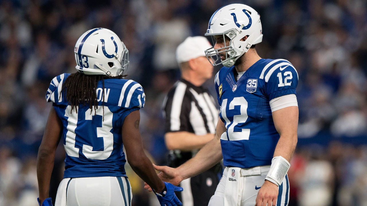 INDIANAPOLIS, IN - DECEMBER 16: Indianapolis Colts quarterback Andrew Luck (12) and Indianapolis Colts wide receiver T.Y. Hilton (13) celebrate a first down during the NFL game between the Indianapolis Colts and Dallas Cowboys on December 16, 2018, at Lucas Oil Stadium in Indianapolis, IN.