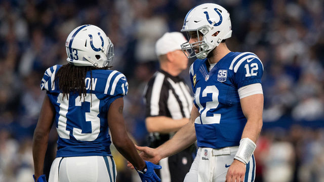 INDIANAPOLIS, IN - DECEMBER 16: Indianapolis Colts quarterback Andrew Luck (12) and Indianapolis Colts wide receiver T.Y. Hilton (13) celebrate a first down during the NFL game between the Indianapolis Colts and Dallas Cowboys on December 16, 2018, at Lucas Oil Stadium in Indianapolis, IN.