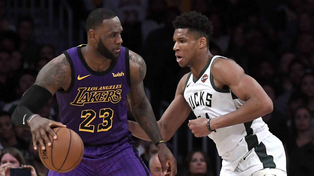 LOS ANGELES, CALIFORNIA - MARCH 01: LeBron James #23 of the Los Angeles Lakers is guraded by Giannis Antetokounmpo #34 of the Milwaukee Bucks during the game at Staples Center on March 01, 2019 in Los Angeles, California.