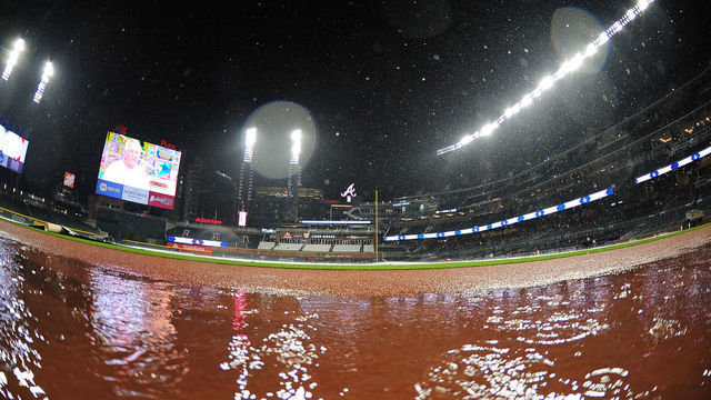 ATLANTA, GA - SEPTEMBER 5: The Atlanta Braves and the Texas Rangers wait out a pregame rain delay at SunTrust Park on September 5, 2017 in Atlanta, Georgia.