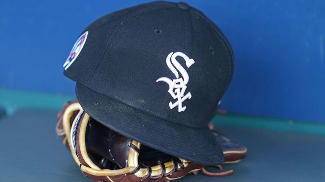 KANSAS CITY, MO - SEPTEMBER 11: A view of a White Sox hat and glove before an MLB game between the Chicago White Sox and Kansas City Royals on September 11, 2018 at Kauffman Stadium in Kansas City, MO.