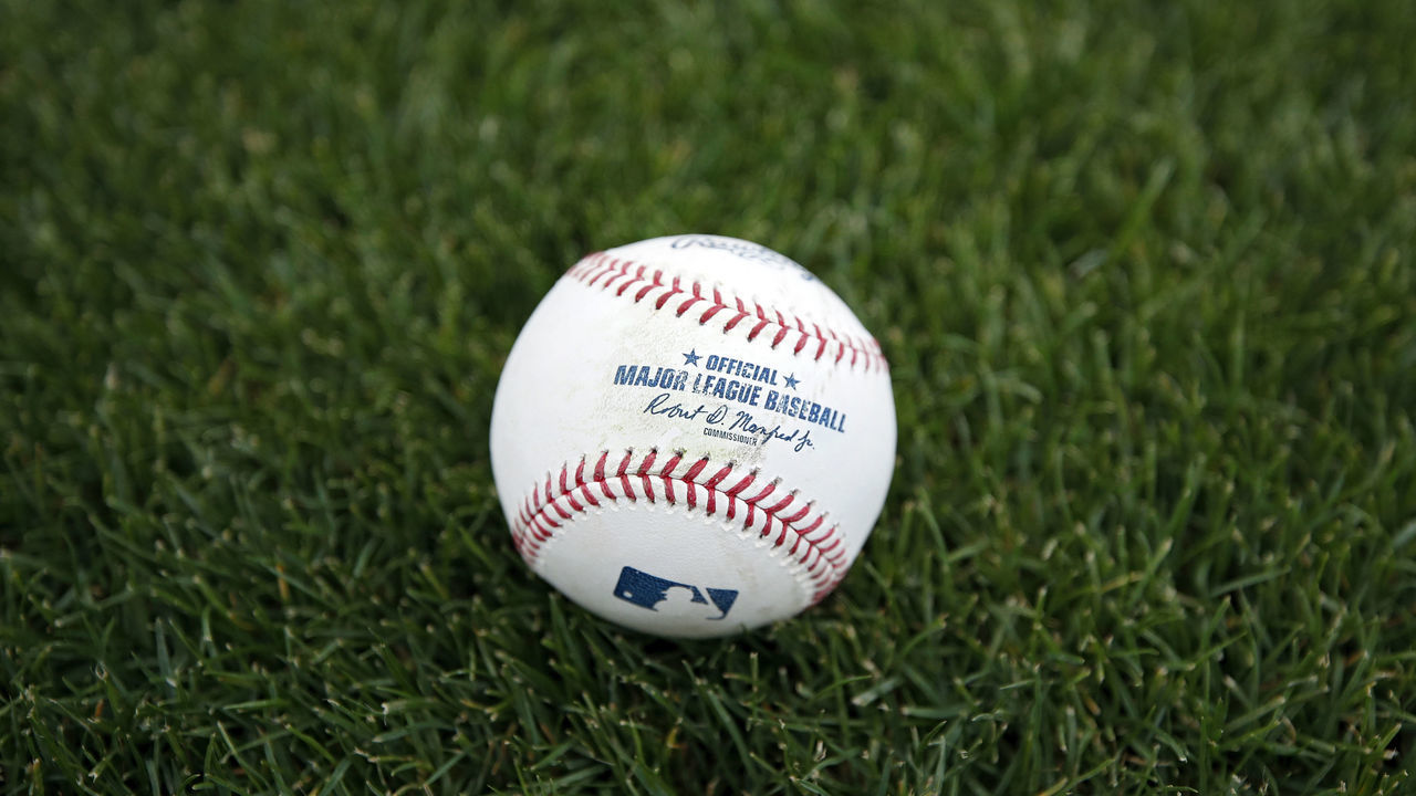 CINCINNATI, OH - MAY 03: Detailed view of official Major League baseball in the grass before a game between the San Francisco Giants and Cincinnati Reds at Great American Ball Park on May 3, 2019 in Cincinnati, Ohio. The Giants won 12-11 in 11 innings.