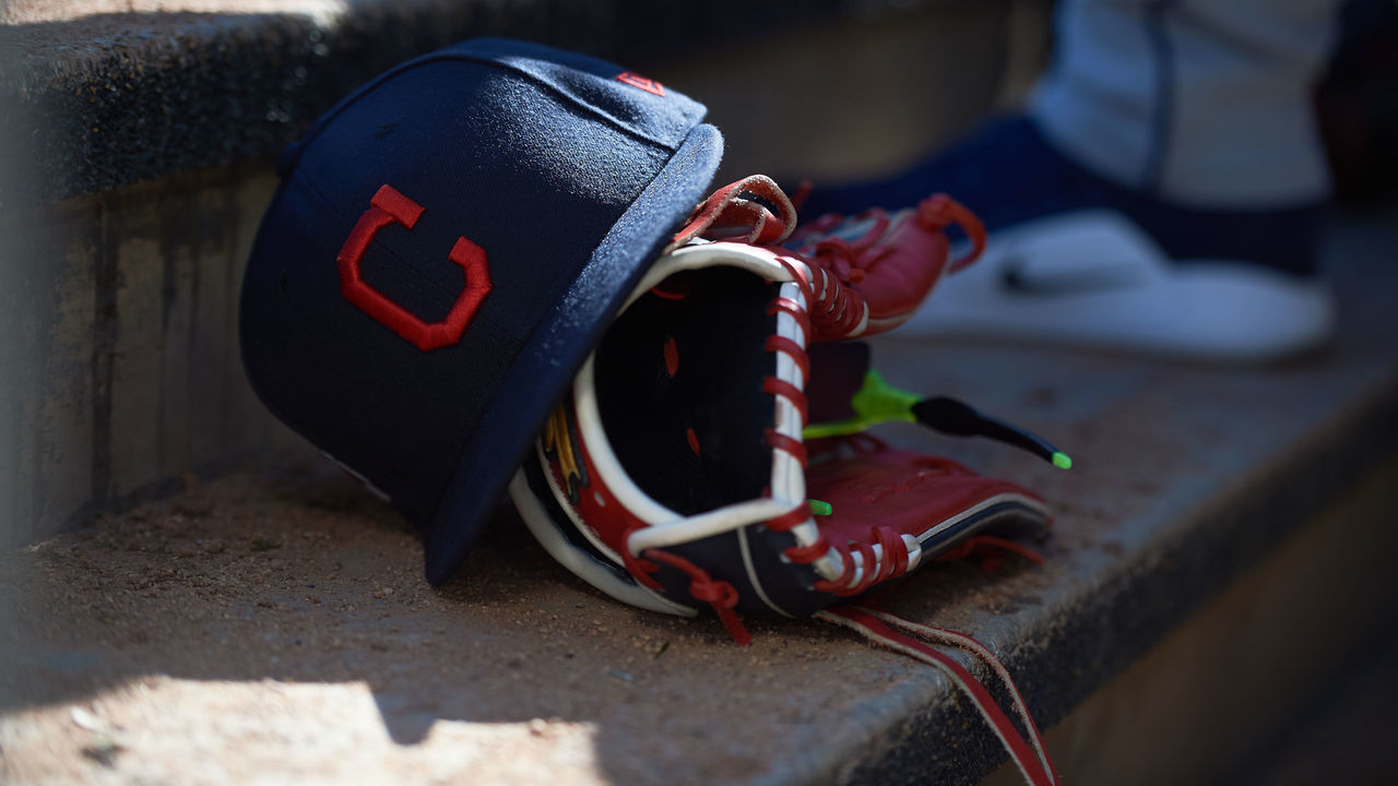 MINNEAPOLIS, MN - MARCH 30: A Cleveland Indians hat and glove are seen during the game between the Minnesota Twins and the Cleveland Indians on March 30, 2019 at Target Field in Minneapolis, Minnesota. The Indians defeated the Twins 2-1.
