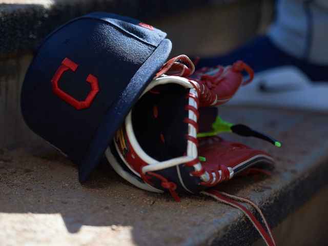 MINNEAPOLIS, MN - MARCH 30: A Cleveland Indians hat and glove are seen during the game between the Minnesota Twins and the Cleveland Indians on March 30, 2019 at Target Field in Minneapolis, Minnesota. The Indians defeated the Twins 2-1.