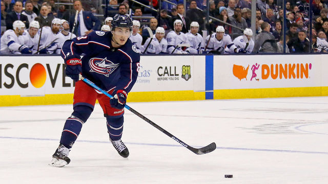 COLUMBUS, OH - FEBRUARY 18: Zach Werenski #8 of the Columbus Blue Jackets passes the puck during the game against the Tampa Bay Lightning on February 18, 2019 at Nationwide Arena in Columbus, Ohio.