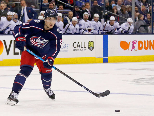 COLUMBUS, OH - FEBRUARY 18: Zach Werenski #8 of the Columbus Blue Jackets passes the puck during the game against the Tampa Bay Lightning on February 18, 2019 at Nationwide Arena in Columbus, Ohio.