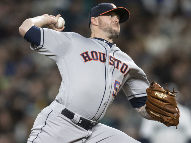 SEATTLE, WA - APRIL 13: Reliever Ryan Pressly #55 of the Houston Astros delivers a pitch during the eighth inning of a game against the Seattle Mariners at T-Mobile Park on April 13, 2019 in Seattle, Washington. The Astros won 3-1.