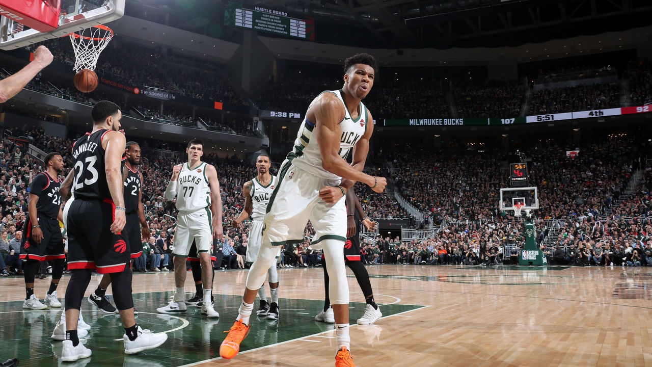 MILWAUKEE, WI - MAY 17: Giannis Antetokounmpo #34 of the Milwaukee Bucks reacts to a play against the Toronto Raptors during Game Two of the Eastern Conference Finals on May 17, 2019 at the Fiserv Forum in Milwaukee, Wisconsin. NOTE TO USER: User expressly acknowledges and agrees that, by downloading and/or using this photograph, user is consenting to the terms and conditions of the Getty Images License Agreement. Mandatory Copyright Notice: Copyright 2019 NBAE